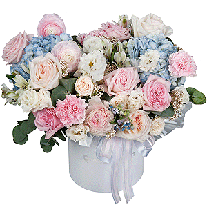 Blue/purple hydrangea - 2, Peony style roses - 3, Ranunculus Pink - 3, lisianthus - 3, Pink carnation - 5, Alstromeria white, soft pink - 7, Peony sprayrose - 2, Peony rose pink 'OHara' - 3, Round flower box medium, Oasis, Ozotamnus, Oksipetalum, Eucalyptus, Ribbon