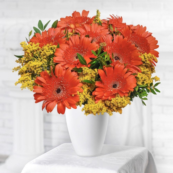 Gerbera daisies - 12, Solidago (1 pc.), Pistachio, Mesh (Abaka), Ribbon