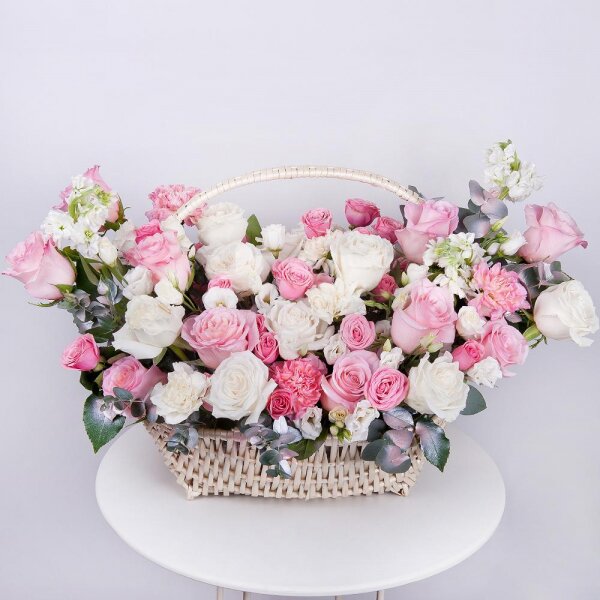 White Matthiola - 3, Pink rose 50 cm - 19, White rose 50 cm - 16, Pink carnation - 6, lisianthus - 6, Spray rose: white, cream, light pink 50 cm - 7, Carnation white, cream - 5, Large Basket, Oasis, Eucalyptus Cinerea