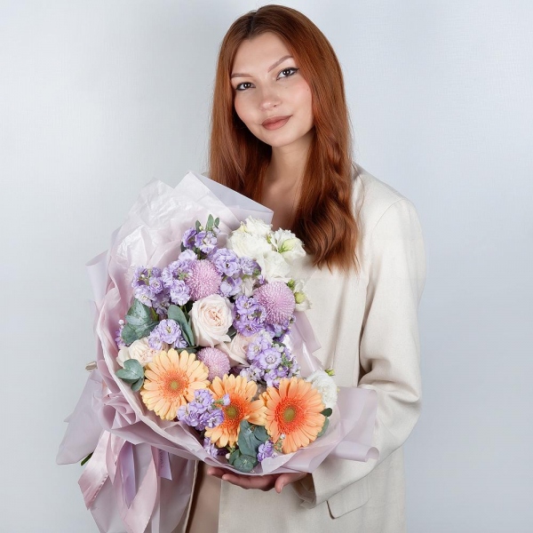 Cream gerbera - 7, Peony style roses - 3, Momoko Chrysanthemum - 3, Matthiola Lilac - 5, lisianthus - 3, Eucalyptus, Wrapping Paper