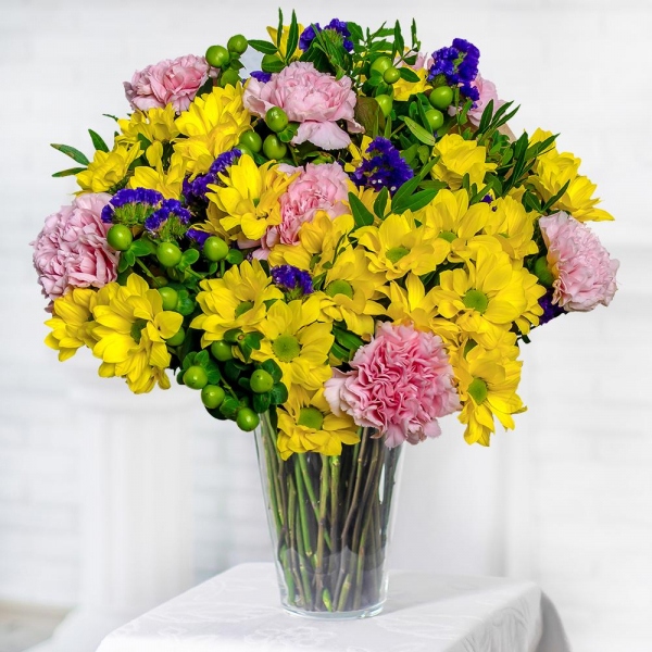 Bacardi Yellow Spray Chrysanthemum - 8, Pink carnation - 9, Blue Statice, Hypericum, Pistachio, Wrapping Paper, Ribbon