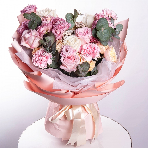 White rose 50 cm Ecuador - 5, Peony rose pink 'OHara' - 3, Pink Lisianthus (Eustoma) - 3, Baltica White Spray Chrysanthemum - 2, Spray rose: white, cream, light pink 50 cm - 5, Pink carnation - 9, Eucalyptus, Ozotamnus, Wrapping Paper