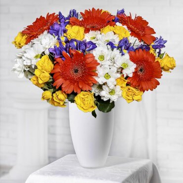 Spray rose: yellow, orange 50 cm - 9, Bacardi White Spray Chrysanthemum - 6, Gerbera daisies - 5, Irises - 10, Jute 1 meter, Ribbon