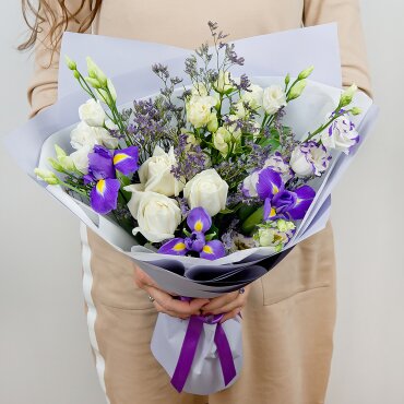 Irises - 3, lisianthus - 1, White rose 50 cm - 3, Spray rose: white, cream, light pink 50 cm - 1, Purple Lisianthus (Eustoma) - 1, Limonium (1 pc.), Wrapping Paper