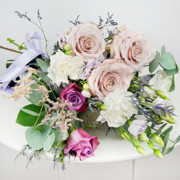 lisianthus - 4, Carnation white, cream - 4, Deep Purple rose - 3, Rose Powder 50 cm Ecuador (Quicksand, Menta) - 4, Limonium (1 pc.), Eucalyptus Cinerea, Ribbon