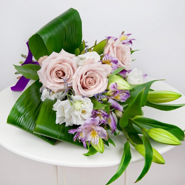 Lilies - 2, lisianthus - 4, Alstromeria lilac, purple - 3, Rose Powder 50 cm Ecuador (Quicksand, Menta) - 5, Limonium (1 pc.), Aspidistra (1 pc.), Ribbon