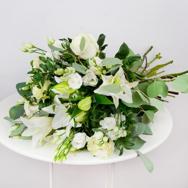 Lilies - 5, White rose 50 cm - 7, lisianthus - 5, Pistachio, Eucalyptus populus (1 pc.), Ribbon