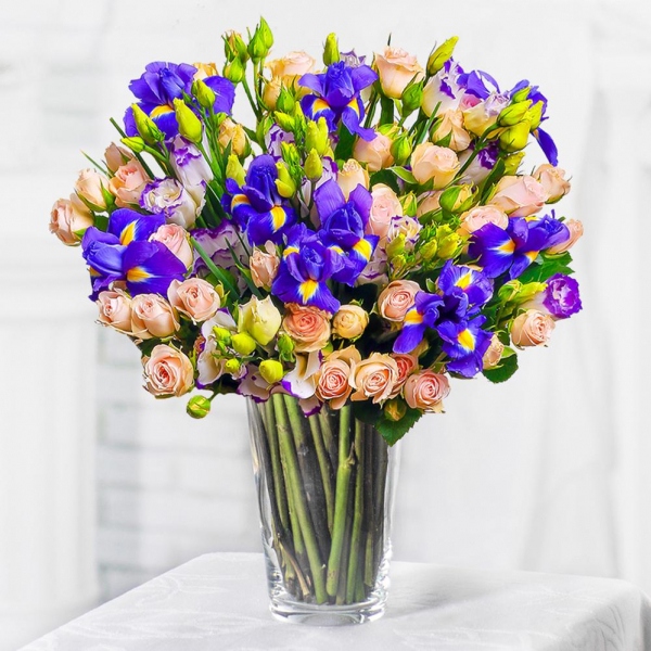 Spray rose: white, cream, light pink 50 cm - 14, Irises - 15, Purple Lisianthus (Eustoma) - 8, Mesh (Abaka), Ribbon