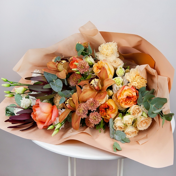 Orchid bud yellow/brown Cymbidium - 3, Pink rose 50 cm - 5, Athos poms Stallion - 2, Spray rose: white, cream, light pink 50 cm - 3, lisianthus - 2, Flask for orchids, Carnation white, cream, Leukodendron, Eucalyptus Cinerea, Pistachio, Wrapping Paper