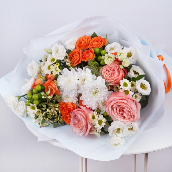 Baltica White Spray Chrysanthemum - 2, Santini White Spray Chrysanthemum - 4, Spray rose: yellow, orange 50 cm - 4, Peony rose Kahala 50 cm - 5, lisianthus - 2, Hypericum, Pistachio, Wrapping Paper