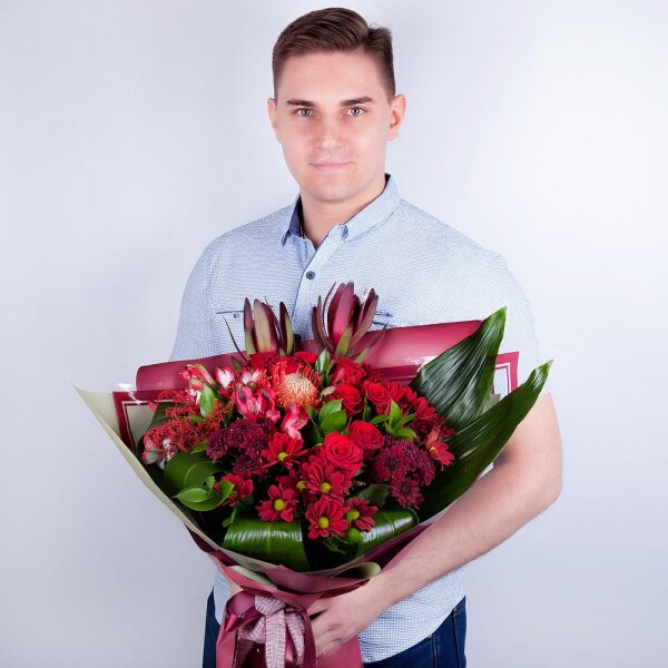 Bacardi Red Spray Chrysanthemum - 3, Red rose 50 cm - 10, Alstromeria Red, Bright Pink - 4, Daisy poms Santini pink, purple - 3, Leukodendron, Aspidistra (1 pc.), Solidago (1 pc.), Wrapping Paper, Ribbon, Ruscus, Nutan