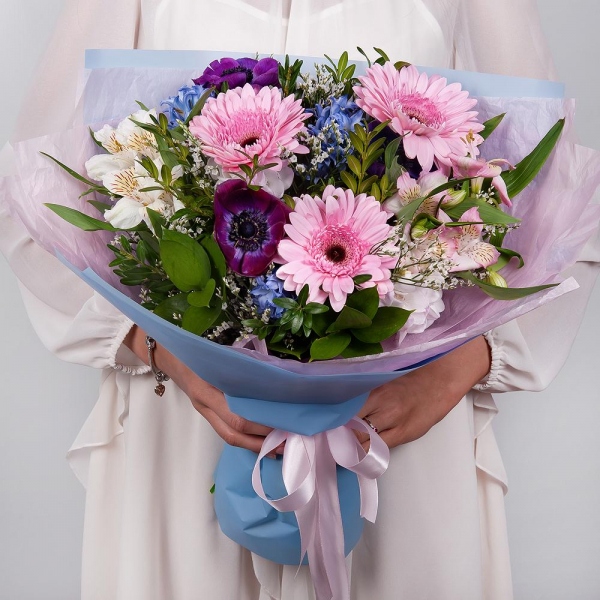 Gerbera pink - 3, Blue anemone - 4, Blue Hyacinth - 4, Alstromeria white, soft pink - 4, Freesia - 2, Limonium (1 pc.), Pistachio, Ruscus, Wrapping Paper