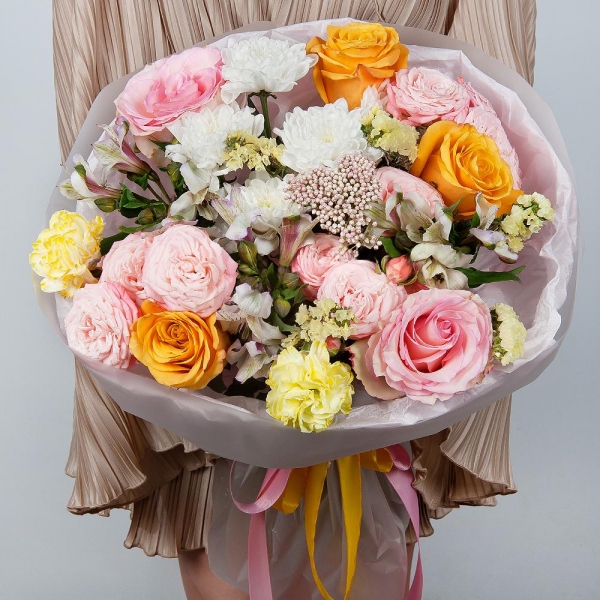 Yellow rose 50 cm - 5, Pink rose 50 cm - 3, Baltica White Spray Chrysanthemum - 1, Peony sprayrose - 3, Alstromeria white, soft pink - 4, Yellow carnation - 2, Yellow Statice, Ozotamnus, Wrapping Paper