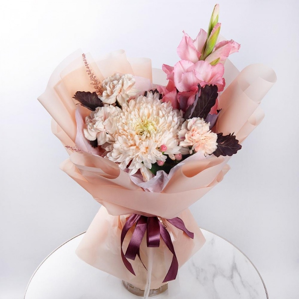 Pink Gladiolus - 1, Magnum White Chrysanthemum - 1, Carnation white, cream - 7, Hypericum, Astilbe, Salal, Wrapping Paper