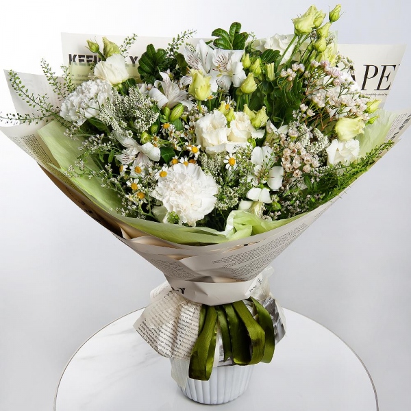 Carnation white, cream - 5, lisianthus - 2, Alstromeria white, soft pink - 4, Chamomile - 2, Pistachio, Veronica spray, Green bell (1 pc.), Waxflower (1 pc.), Limonium (1 pc.), Wrapping Paper