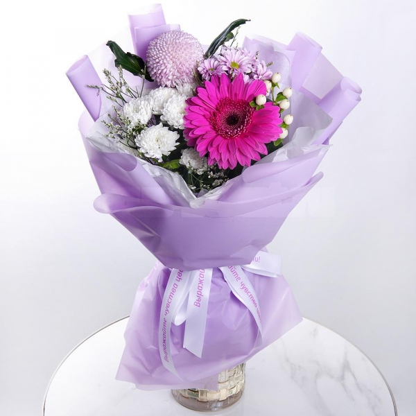 Purple gerbera - 3, Baltica White Spray Chrysanthemum - 2, Momoko Chrysanthemum - 1, Daisy poms Santini pink, purple - 1, Hypericum, Limonium (1 pc.), Wrapping Paper
