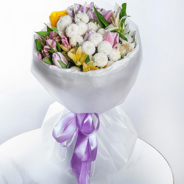 Newton White Spray Chrysanthemum - 2, Alstromeria white, soft pink - 2, Lilac tulip - 4, Alstromeria Yellow, Orange - 1, Alstromeria lilac, purple - 1, Pink tulip - 3, Yellow tulip - 2, Wrapping Paper